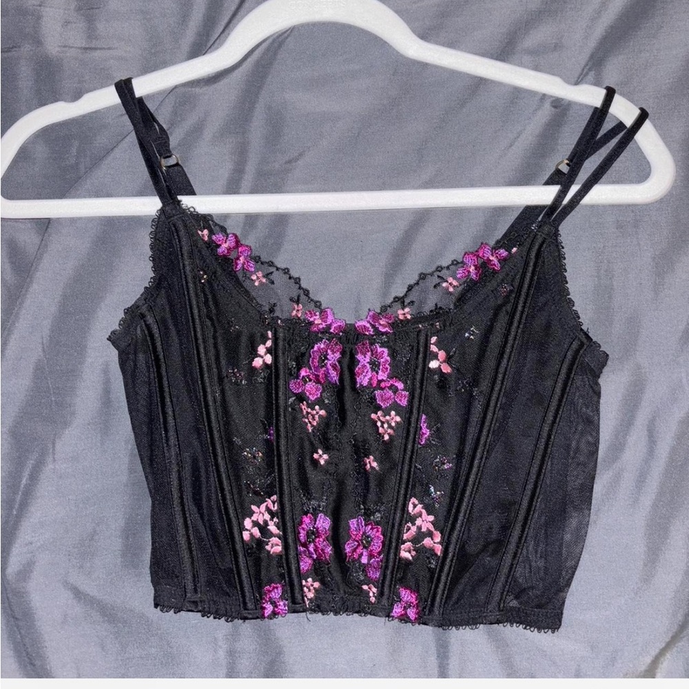 Victoria’s Secret black corset with flowers. Very cute and chic.